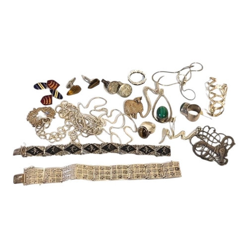 102 - A COLLECTION OF VINTAGE SILVER AND WHITE METAL JEWELLERY
To include a pierced bracelet,a necklace an... 