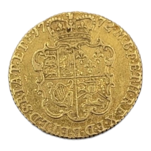 104 - A KING GEORGE III 22CT GOLD FULL GUINEA COIN, DATED 1772 
With portrait bust, bearing garnished crow... 