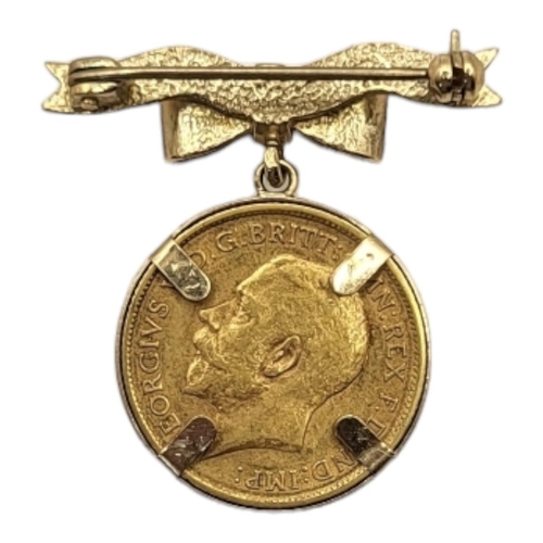 109 - A KING GEORGE V 22CT GOLD HALF SOVEREIGN PENDANT BROOCH, DATED 1912
With portrait bust and George an... 