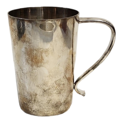 11 - A SOLID SILVER TANKARD OF PLAIN DESIGN
With hollow handle, London, 1973, by J.R.N., engraved to one ... 