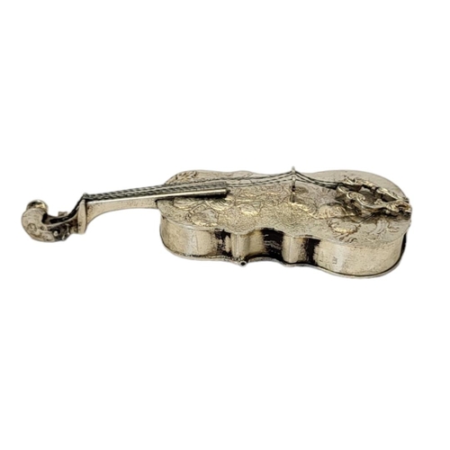 124 - A 19TH CENTURY CONTINENTAL SILVER NOVELTY CELLO SNUFF BOX
Having a hinged compartment to rear and em... 