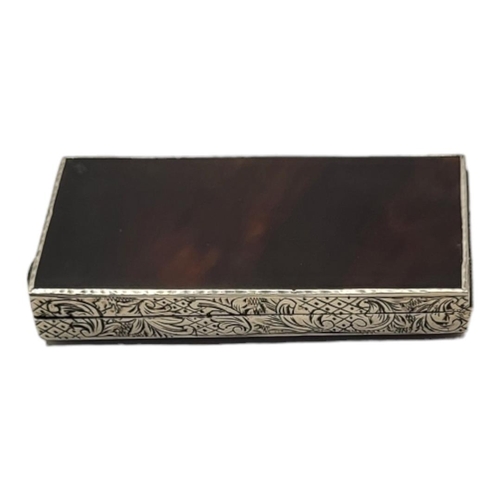 127 - AN EARLY 20TH CENTURY CONTINENTAL SILVER AND TORTOISESHELL TOOTHPICK BOX
Set with tortoiseshell pane... 