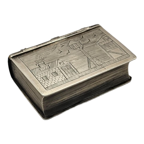 128 - A VICTORIAN SILVER NOVELTY 'BOOK' SNUFF BOX
Having engraved landscape decoration of a dovecot with l... 