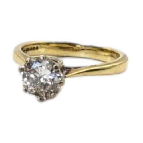 134 - A VINTAGE 18CT GOLD AND 1.25CT DIAMOND SOLITAIRE RING
The single round cut diamond set in a plain go... 