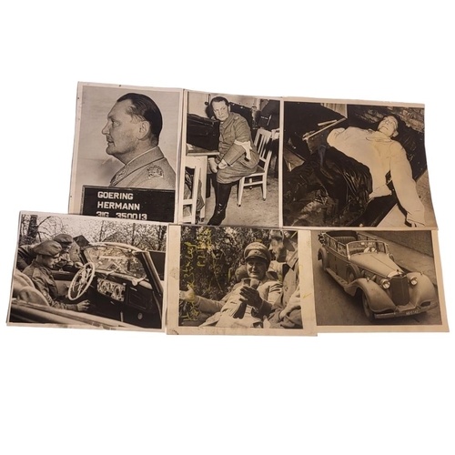 142 - WWII INTEREST, A GROUP OF SIX PRESS PHOTOGRAPHS OF HERMANN GOERING
Including his mugshot at the time... 