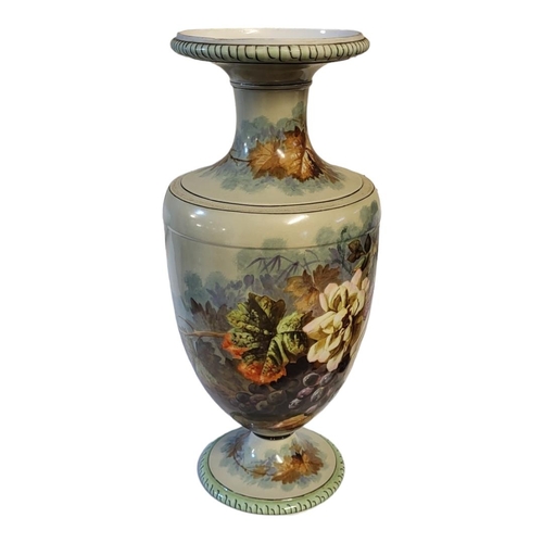 159 - A 19TH CENTURY CONTINENTAL AMPHORA SHAPED HARD PASTE PORCELAIN PEDESTAL VASE
In the manner of Paris ... 