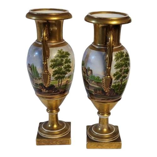 160 - A PAIR OF EARLY 19TH CENTURY CONTINENTAL PORCELAIN CAMPANA SHAPED TWIN HANDLED PEDESTAL VASES
Centra... 