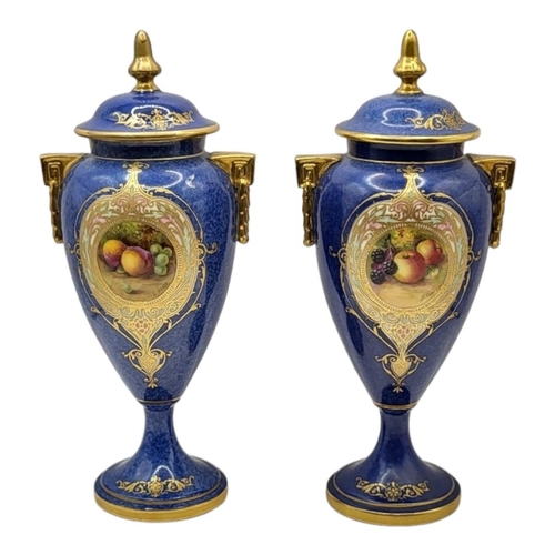 167 - ROYAL WORCESTER, A PAIR OF BONE CHINA LIDDED CABINET VASES AND COVERS, CIRCA 1930
Coloured enamels w... 