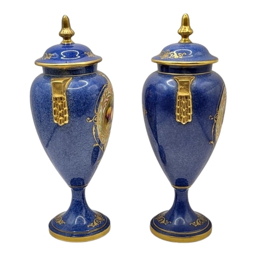 167 - ROYAL WORCESTER, A PAIR OF BONE CHINA LIDDED CABINET VASES AND COVERS, CIRCA 1930
Coloured enamels w... 