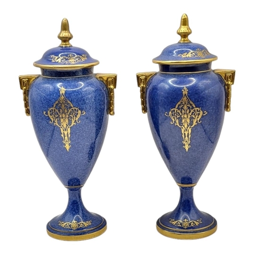 167 - ROYAL WORCESTER, A PAIR OF BONE CHINA LIDDED CABINET VASES AND COVERS, CIRCA 1930
Coloured enamels w... 