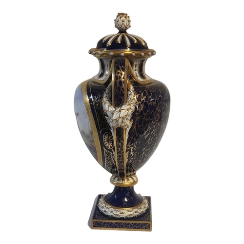 176 - HAWKINS FOR ROYAL WORCESTER, AN IMPRESSIVE  AMPHORA SHAPED JEWELLED PEDESTAL LIDDED VASE AND COVER
S... 