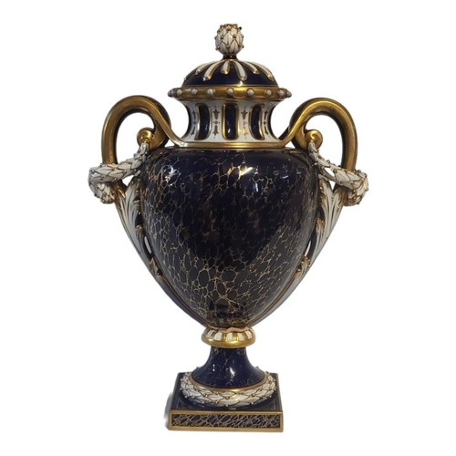 176 - HAWKINS FOR ROYAL WORCESTER, AN IMPRESSIVE  AMPHORA SHAPED JEWELLED PEDESTAL LIDDED VASE AND COVER
S... 