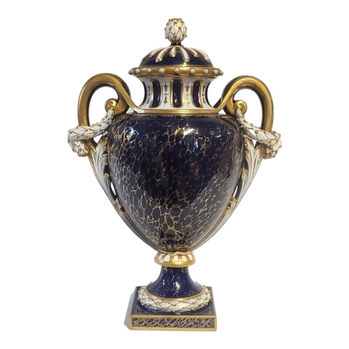 176 - HAWKINS FOR ROYAL WORCESTER, AN IMPRESSIVE  AMPHORA SHAPED JEWELLED PEDESTAL LIDDED VASE AND COVER
S... 