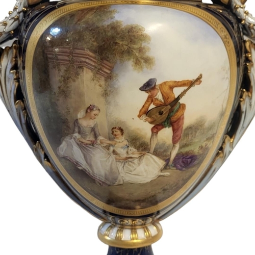 176 - HAWKINS FOR ROYAL WORCESTER, AN IMPRESSIVE  AMPHORA SHAPED JEWELLED PEDESTAL LIDDED VASE AND COVER
S... 