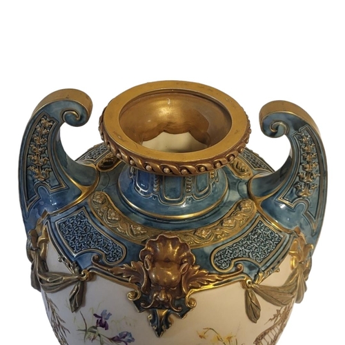 177 - ROYAL WORCESTER, A LOUIS XVI ROCOCO STYLE JEWELLED TWIN HANDLED CENTREPIECE VASE
On square polished ... 