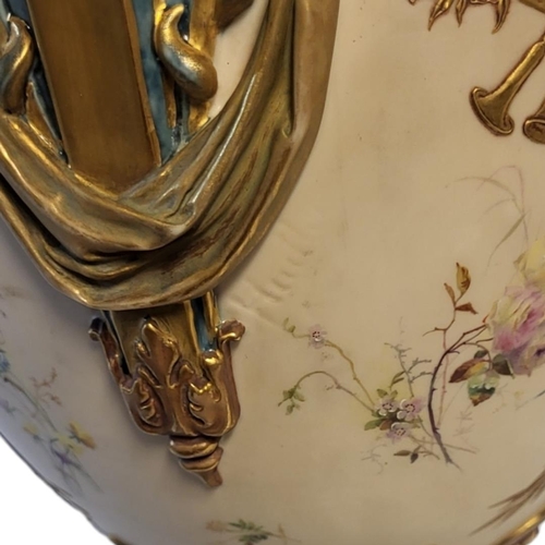 177 - ROYAL WORCESTER, A LOUIS XVI ROCOCO STYLE JEWELLED TWIN HANDLED CENTREPIECE VASE
On square polished ... 