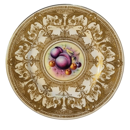 180 - COOPER AND HIGGINS FOR ROYAL WORCESTER, A PAIR OF EARLY 20TH CENTURY JEWELLED CABINET PLATES
Both pa... 