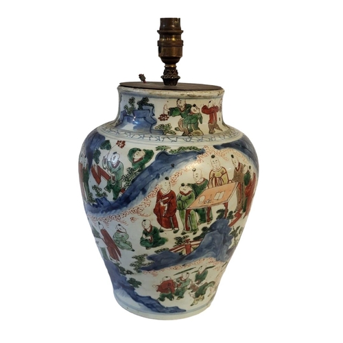 202 - A CHINESE FAMILLE ROSE WUCAI BALUSTER LAMP BASE
In Thousand Boys pattern, polychrome enamelled with ... 