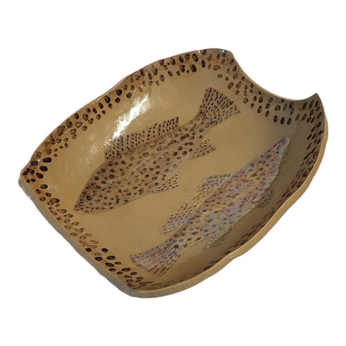 220 - STEVE DUFFY FOR RYE POTTERY, EAST SUSSEX, AN EARTHENWARE PEDESTAL SERVING DISH
With stylised fish, s... 