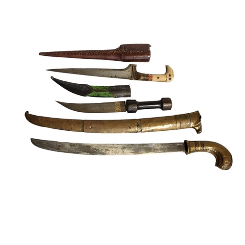 240 - A COLLECTION OF 19TH CENTURY AND LATER CEREMONIAL DAGGERS
To include an ottoman Kurdish Khanja with ... 