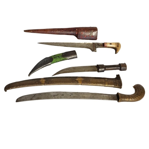 240 - A COLLECTION OF 19TH CENTURY AND LATER CEREMONIAL DAGGERS
To include an ottoman Kurdish Khanja with ... 