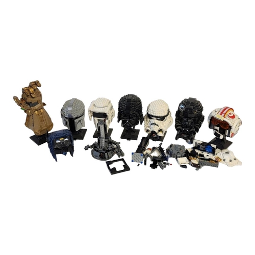 243 - STAR WARS LEGO, A COLLECTION OF ASSEMBLED HEADS
Including Darth Vader and Stormtooper helmets, toget... 