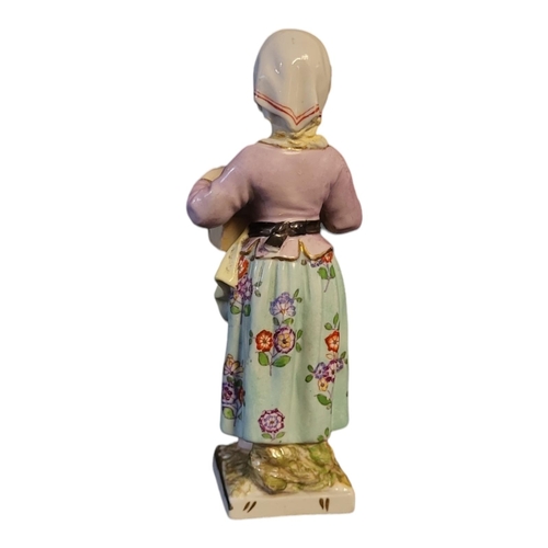 248 - KPM - ROYAL PORCELAIN MANUFACTORY OF BERLIN, A PORCELAIN MODEL OF A FEMALE STREET VENDOR, CIRCA 1800... 