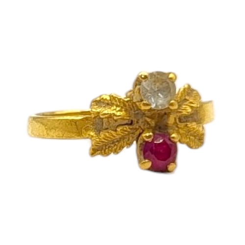 47 - A 22CT GOLD AND RUBY RING
The single round cut stone set in a textured mount.
(size M)

Condition: g... 