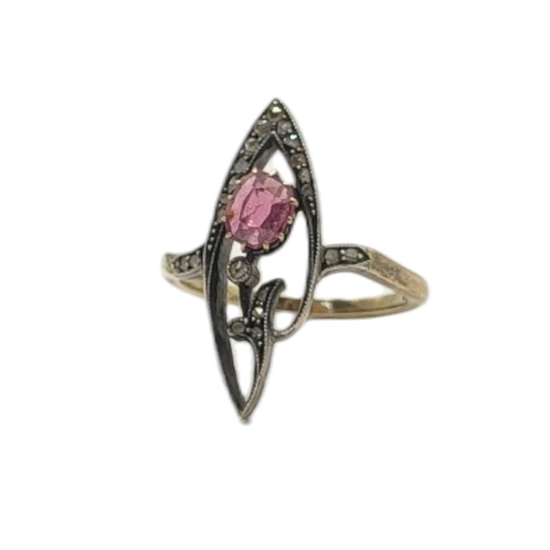 70 - AN EARLY 20TH CENTURY 14CT GOLD, RUBY AND DIAMOND RING
Set with an oval cut ruby edged with diamonds... 