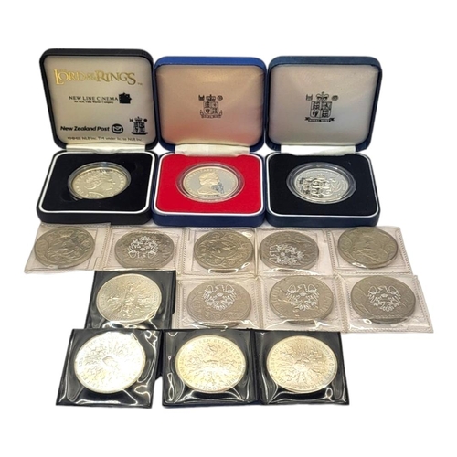 92 - A COLLECTION OF THREE QUEEN ELIZABETH II SILVER COINS
To include a five pound coin, dated 1990, a tw... 