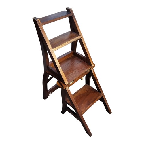 588 - A VICTORIAN STYLE MAHOGANY METAMORPHIC CHAIR/LIBRARY STEPS.
(44cm x 40cm x 88cm)

Condition: good ov... 