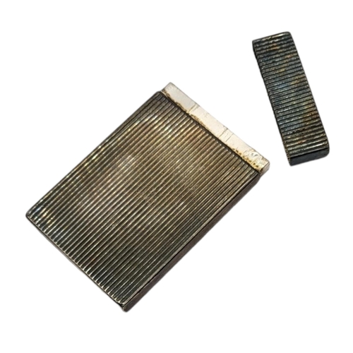 10 - AN EARLY 20TH CENTURY CONTINENTAL WHITE METAL CALLING CARD CASE
Rectangular form with reeded design.... 