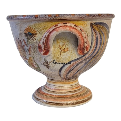 156 - AN ITALIAN MODIGLIANI ETRUSCAN INSPIRED DESIGN TERRACOTTA PEDESTAL BOWL, CIRCA 2007
Hand thrown pott... 