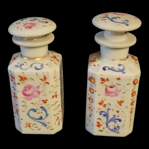 161 - A PAIR OF 19TH CENTURY FRENCH PORCELAIN SCENT BOTTLES
Octagonal form, with floral decoration
(approx... 