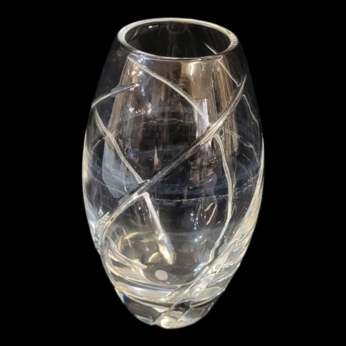 179 - TIFFANY AND CO., A VINTAGE CUT LEAD CRYSTAL VASE
Having entwined cuts and Tiffany and Co. stencil ma... 