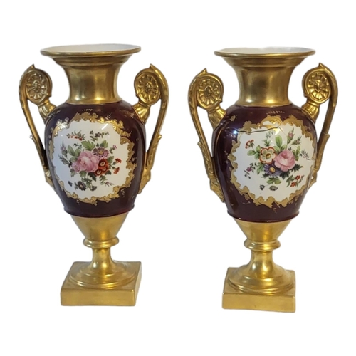 182 - A PAIR OF EARLY 20TH CENTURY EMPIRE STYLE PARIS PORCELAIN JEWELLED TWIN HANDLED PEDESTAL VASES
Each ... 