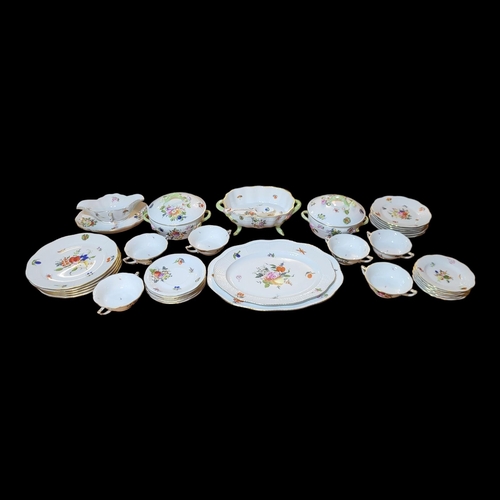 189 - HEREND, A 20TH CENTURY HARD PORCELAIN DINNER SERVICE, CIRCA 1930
Comprising thirty-six pieces in Sum... 