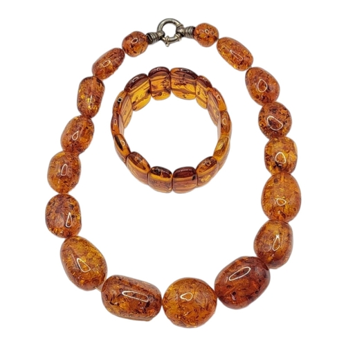 2 - A VINTAGE BALTIC AMBER NECKLACE AND BRACELET
Graduated beads with Continental silver clasp, together... 