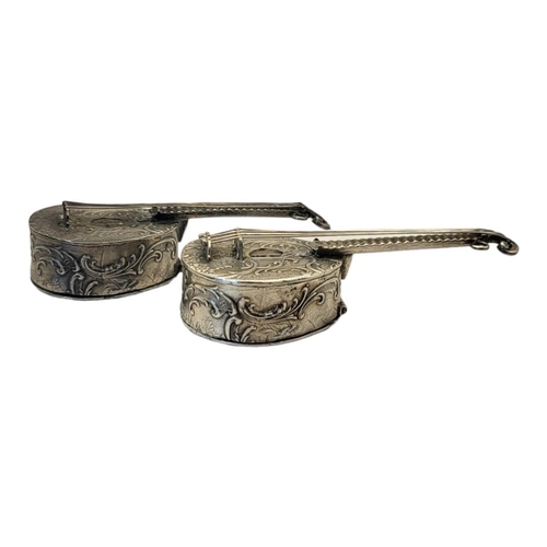 21 - TWO VINTAGE SILVER MANDOLIN SNUFF BOX
Having a hinged compartment to rear and embossed figural decor... 