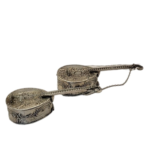 24 - TWO EARLY 20TH CENTURY SILVER NOVELTY MANDOLIN PILL BOXES
Having a hinged compartment to rear and em... 