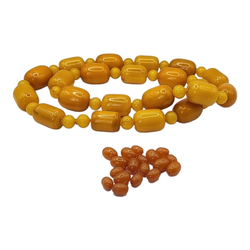 3 - A VINTAGE BUTTERSCOTCH RECTANGULAR AMBER NECKLACE 
Beads with spherical spacers links, together with... 