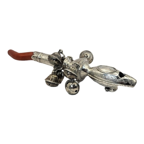 45 - A GEORGIAN SILVER AND CORAL CHILD'S RATTLE
Having a whistle finial, eight bells, engraved decoration... 