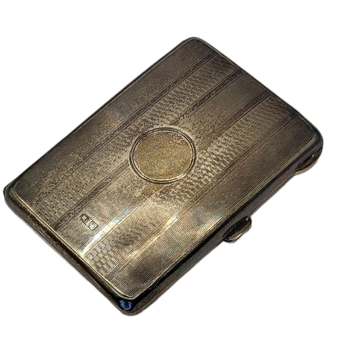 8 - AN EARLY 20TH CENTURY SILVER AND LEATHER CALLING CARD CASE
Engine turned decoration with fitted brow... 