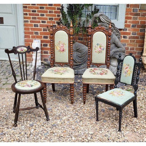 506 - A PAIR OF VICTORIAN MAHOGANY PRIEDIEU CHAIRS
With tapestry upholstery on carved Gothic design back, ... 