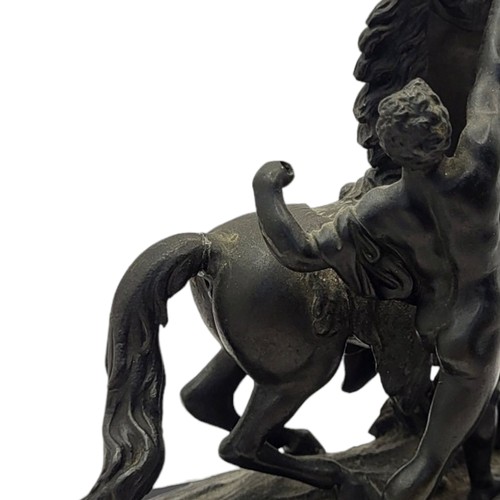 200 - AFTER GUILLAUME COUSTOU, 1677 - 1746, A 20TH CENTURY BRONZE SCULPTURE OF A MARLEY HORSE WITH TRAINER... 