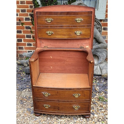 507 - A 19TH CENTURY MAHOGANY BOW- FRONTED COMMODE
The hinged lid and brass handle escutcheons, terminatin... 