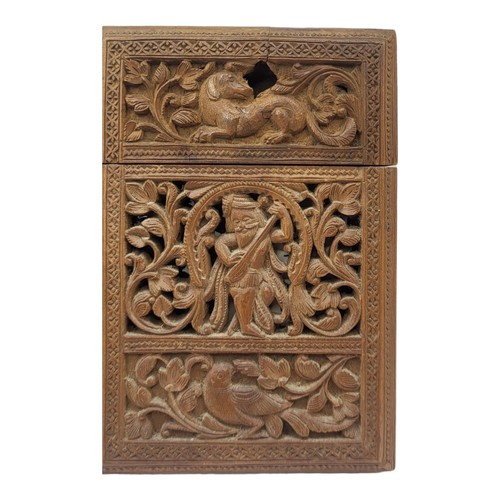 121 - A COLLECTION OF THREE 19TH CENTURY ANGLO INDIAN SANDALWOOD CALLING CARD CASES
Finely carved with ani... 