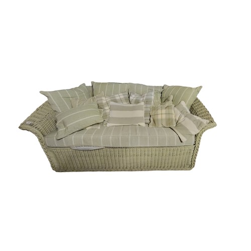 522 - MARSTON LANGINGER, AN ENGLISH WILLOW PALE JADE CONSERVATORY SETTEE
Three seat, complete with loose c... 