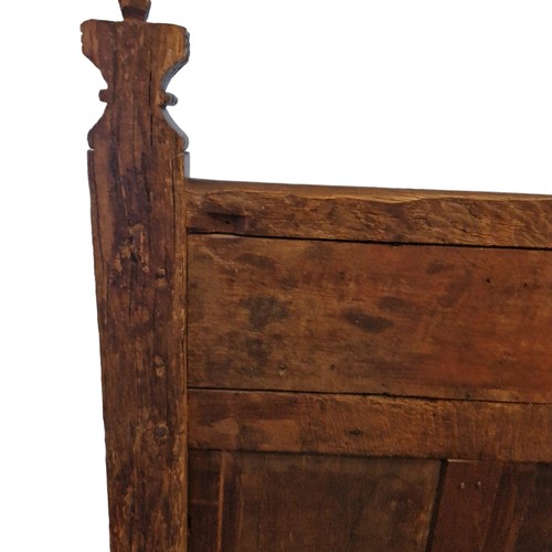 528 - A PAIR OF 19TH CENTURY GOTHIC DESIGN CARVED OAK SINGLE BEDS
Having linen fold and wheel design.
(eac... 