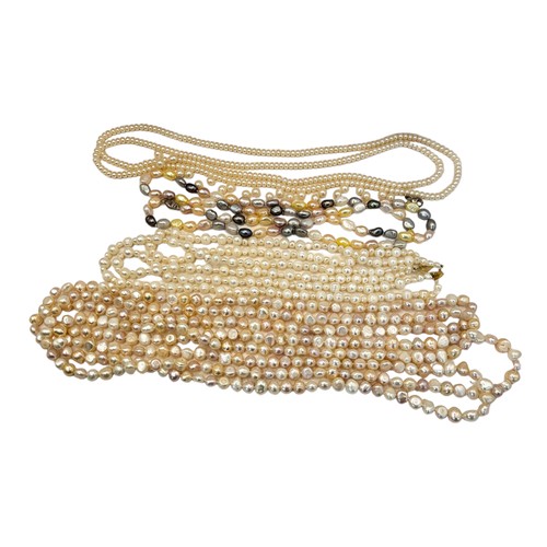 57 - A COLLECTION OF VINTAGE ASIAN PEARL NECKLACES
To include a three strand necklace with 14ct gold clas... 